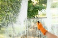 Janitor cleaning window with squeegee indoors Royalty Free Stock Photo