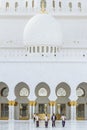 Janitor men cleaning the marble floor of Sheikh Zayed Grand Mosque in the morning at Abu Dhabi, UAE