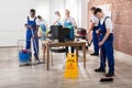 Janitors Cleaning The Office Royalty Free Stock Photo