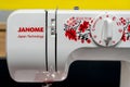 Janome brand logo on a sewing machine. Minsk, Belarus, 2023 Royalty Free Stock Photo