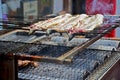 Janpanese people cooking Unagi (eel) or kabayaki or Grilled eels Royalty Free Stock Photo