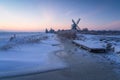 Winter dawn at a traditional windmill Royalty Free Stock Photo