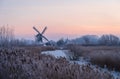 Winter dawn at a traditional windmill Royalty Free Stock Photo