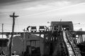 Dramatic high contrast black and white image image of old weathered rusty elevated rail in a salt mine.