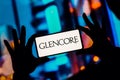 January 11, 2023, Brazil. In this photo illustration, the Glencore Xstrata plc logo is displayed on a smartphone screen