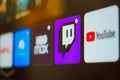 January 8, 2024, Brazil. In this photo illustration the Twitch, YouTube and HBO Max logo is displayed on a TV screen Royalty Free Stock Photo
