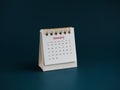 A January 2023 calendar desk for the organizer to plan and reminder isolated on blue background. Royalty Free Stock Photo