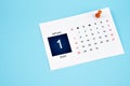 January 2024 calendar page with push pin on blue background Royalty Free Stock Photo