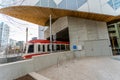 January 11 2019 , Calgary, Alberta - Calgary Transit LRT Train using tunnel under the new Calgary Public Library Royalty Free Stock Photo