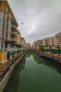 January 10 2020. Canal view in Venice-like Qanat Quartier of the Pearl precinct of Doha, Qatar, with multi-color