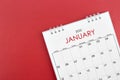 January 2025 desk calendar on red background Royalty Free Stock Photo