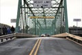 Cars drive over E. Bridge Street, New Hope, Pennsylvania Royalty Free Stock Photo