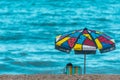 Colorful beach umbrella in the Armacao Beach, in Florianopolis, Brazil