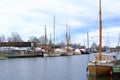 January 28 2023 - Greifswald, Germany: The harbor with wooden sailboats in historic city of Greifswald