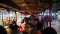 January, 2019 at Kankariya Lake, Ahmedabadm Gujrat: Tourists rushing into a toy train while some passengers wait insde Royalty Free Stock Photo