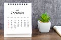 The January 2023 Monthly desk calendar for 2023 with diary on wooden table Royalty Free Stock Photo