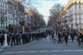 18 January 2020, Parils, France - French police riot squad walking towards Bastille square, the road blocked.