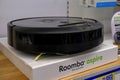 January 2021 Parma, Italy: Roomba vacuum cleaner close-up on store display. Irobot logo icon