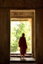 January 3rd 2017, Cambodia, Buddhist monk coming out of one of the doors of the Angkor Wat