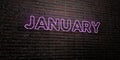 JANUARY -Realistic Neon Sign on Brick Wall background - 3D rendered royalty free stock image