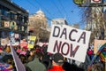 `Daca now` sign carried by a participant at the Women`s March