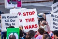 January 4, 2020 San Jose / CA / USA - Close up of Stop The Wars sign raised at the anti-war protest in front of the Cityhall in