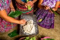 Mayan women preparing food called tamales in Guatemala