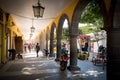 January 12, 2017. Talaquepaque, Guadalajara, Mexico. Street vendors and shoe polishers