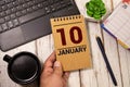 January 10th. Day 10 of january month, calendar on yellow background. Winter time. Royalty Free Stock Photo