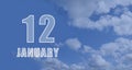january 12. 12-th day of the month, calendar date.White numbers against a blue sky with clouds. Copy space, winter month Royalty Free Stock Photo