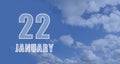 january 22. 22-th day of the month, calendar date.White numbers against a blue sky with clouds. Copy space, winter month Royalty Free Stock Photo