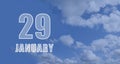 january 29. 29-th day of the month, calendar date.White numbers against a blue sky with clouds. Copy space, winter month Royalty Free Stock Photo