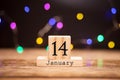 January 14th. Day 14 of month, calendar on wooden background. Winter time Royalty Free Stock Photo