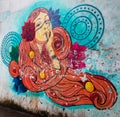 January 19th 2022 Dehradun City India. A colorful wall graffiti of a gothic woman. Modern youth, generation Z lifestyle