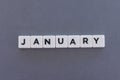 January word made of square letter word on grey background Royalty Free Stock Photo