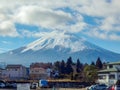 2017 January 02. YAMANASHI JAPAN. rural peaceful village with fuji mountain on cloudy day as background