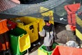 waste workers sorting waste in a landfill