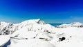 The japan alps  or the snow mountains  of Tateyama Kurobe alpine  in sunshine day with  blue sky background is one of the Royalty Free Stock Photo