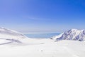 The japan alps  or the snow mountains wall  of Tateyama Kurobe alpine  in sunshine day with  blue sky background is one of the Royalty Free Stock Photo