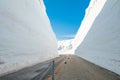 The japan alps or the snow mountains wall of Tateyama Kurobe alpine in sunshine day with blue sky background is one of the Royalty Free Stock Photo