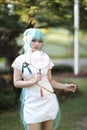 Japan anime cosplay portrait of a girl with chinese dress costume in chinese garden Royalty Free Stock Photo