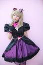 Japan anime cosplay , portrait of girl cosplay in pink room background Royalty Free Stock Photo