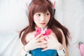 Japan anime cosplay , portrait of girl cosplay in white room background