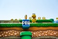 Japan - April 03, 2023: Mario blue power button, green pipe, turtle character and golden coins with game stage grass and soil in Royalty Free Stock Photo