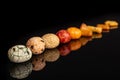 Japan assortment snacks isolated on black glass