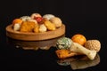 Japan assortment snacks isolated on black glass