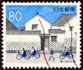 JAPAN - CIRCA 1999: A stamp printed in Japan shows school children before Kikuya family house, Hagi, circa 1999.