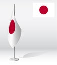 JAPAN flag on flagpole for registration of solemn event, meeting foreign guests. National independence day of JAPAN. Realistic 3D