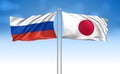 Japan Flag with Russia Flag with cloudy sky Royalty Free Stock Photo