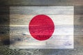 Japan flag on rustic old wood surface background Royalty Free Stock Photo